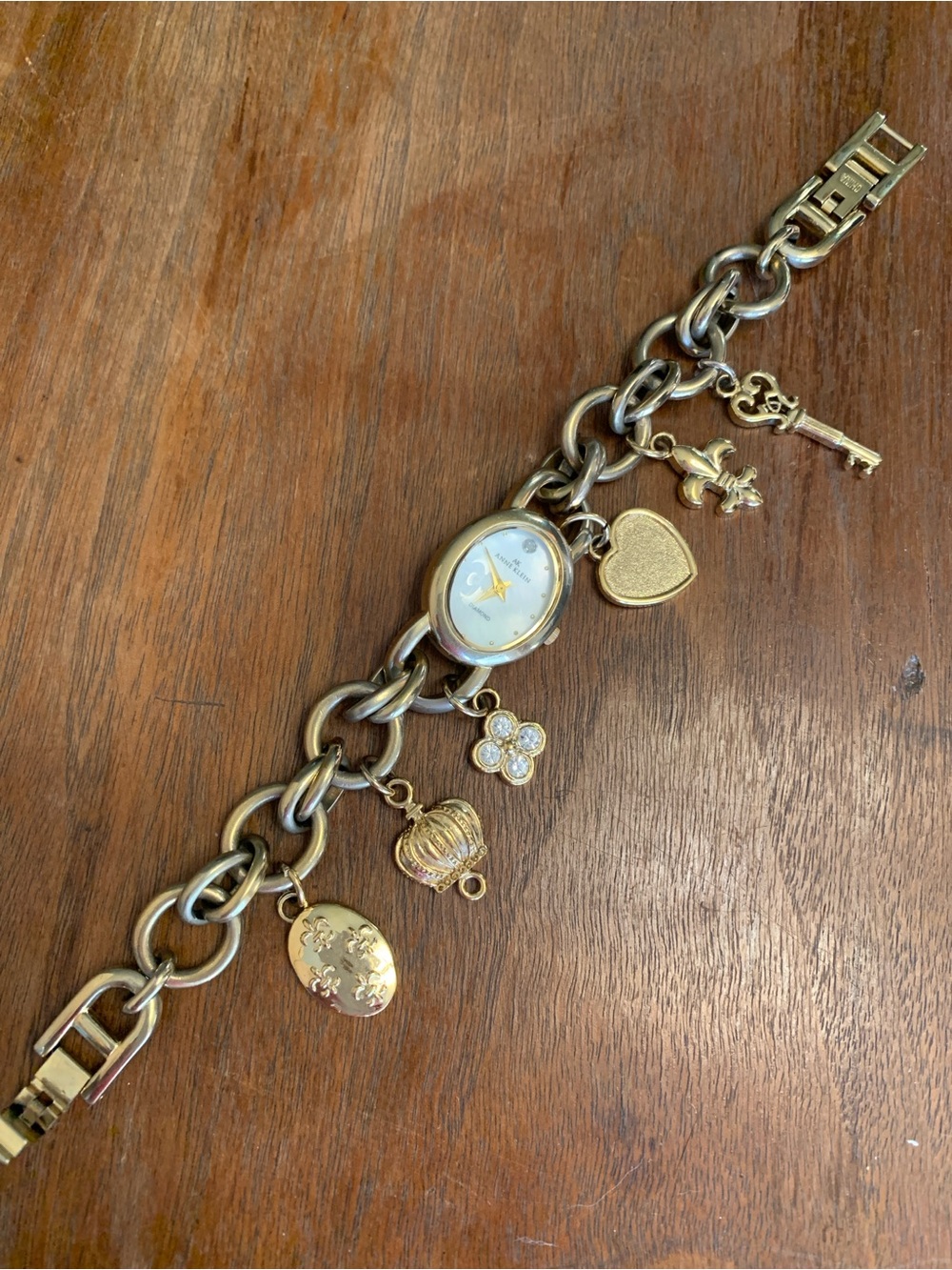 Anne Klein Gold Tone Charm Bracelet Watch with Heart, Key, Fleur-de-Lis